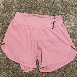 Nike bubblegum pink running shorts
